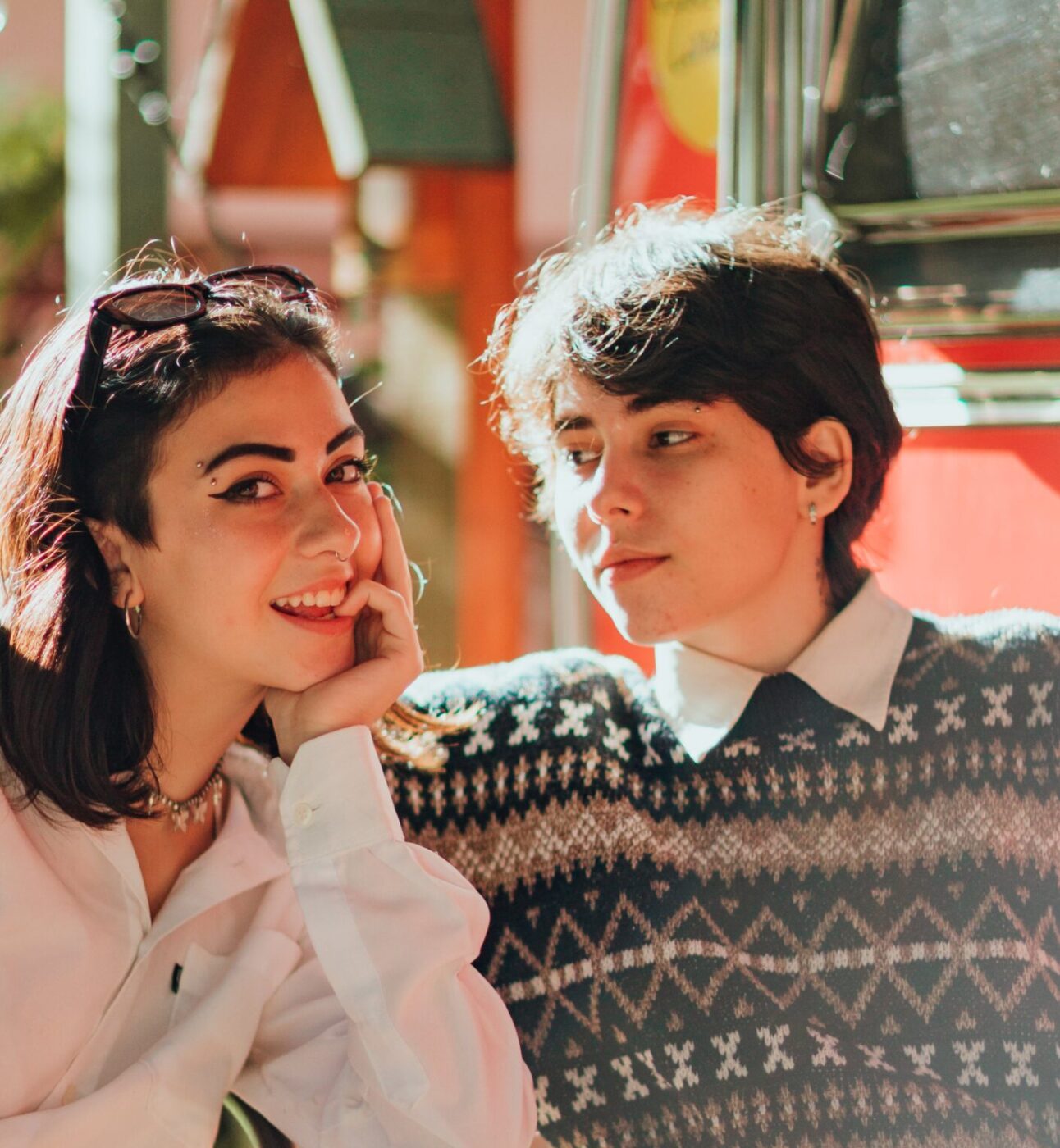 two people sat at a cafe